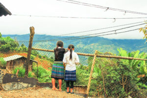 Hmong girls wearing their traditional skirts in Mu Cang Chai Vietnam